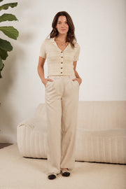 pantalon_beige_tricot_court